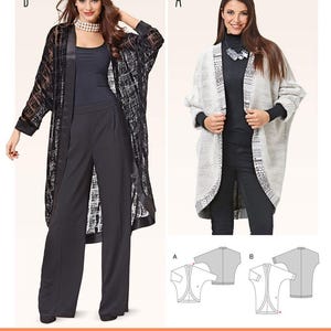 May include: Two women modeling long cardigans and pants. One woman wears a black, patterned cardigan over black pants. The other woman wears a white cardigan with black trim over black pants. The text at the bottom reads: Listing is for sewing pattern only.