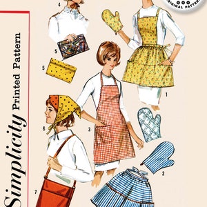 May include: A vintage sewing pattern for a 1960s apron, a skirt, and a bag. The pattern is from Simplicity and has the number 6206 on it. The pattern is for one size.