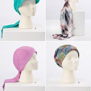 May include: Four different sewing patterns for headwear. The patterns are shown on mannequins wearing the finished headwear. The headwear includes a turquoise hat with a long tail, a pink and black patterned hat, a pink hat with a long tail, and a light pink hat with a long tail.