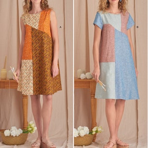 May include: Sewing pattern for a sleeveless A-line dress with a geometric patchwork design in orange, brown, and cream fabrics. The pattern also includes instructions for a short-sleeved version of the dress with a similar design in pink, blue, and white fabrics. The pattern is labelled "A" and "B" for the two versions.