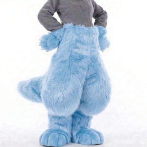 May include: A rustic wooden sign with the text "Welcome to our home" in white lettering. The sign has a distressed finish and a simple, inviting design, ideal for entryway decor.