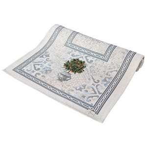 May include: Rolled-up rectangular rug with a detailed pattern in shades of white, gray, and blue. The center features a potted orange tree. The border has a geometric design. The rug is on a white background.
