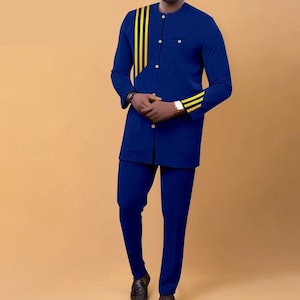 May include: A blue long-sleeved shirt with a yellow stripe design on the shoulder and cuff. The shirt has a button-up front and a pocket on the left chest. The shirt is paired with matching blue pants.