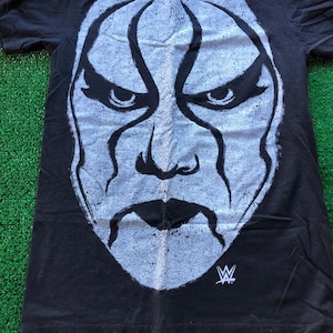 WWE ライセンス スティング「ホワイト ウォリアー」T シャツ