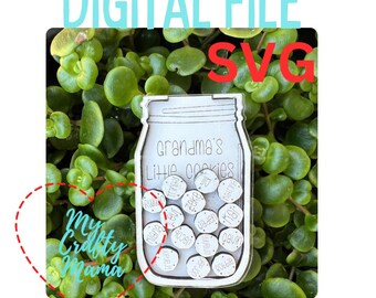 May include: White wooden cutout of a mason jar with the text "Grandma's Little Cookies" and a variety of cookie names written on the individual cookies inside the jar.
