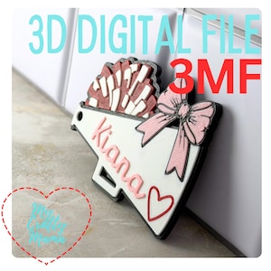 May include: A 3D digital file of a megaphone design with the name "Kiana" in pink. The megaphone has a red and white pom-pom design, a pink bow, and a red heart. The text "3D DIGITAL FILE 3MF" is in the background.