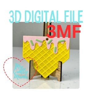 May include: A yellow waffle-shaped 3D digital file with pink icing and green sprinkles. The text "3D DIGITAL FILE" is in light blue, and "BMF" is in red. The image also includes the text "My Crafty Mama" inside a heart.