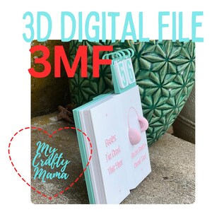May include: A 3D digital file of a paper-like object with the text "3D DIGITAL FILE" and "3MF" in red and blue. The object has a small calendar with the numbers "56" and the text "My Crafty Mama".