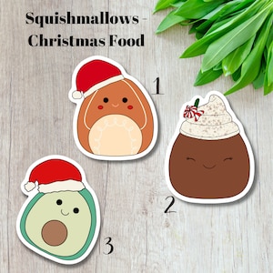 May include: Three colorful stickers featuring Christmas-themed food. One sticker is a gingerbread man wearing a Santa hat. Another is a chocolate dessert with whipped cream and a candy cane. The third is an avocado with a Santa hat. The text "Squishmallows - Christmas Food" is at the top.