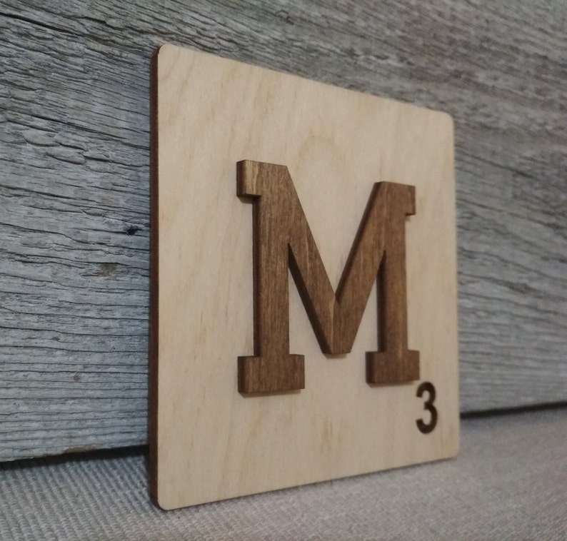 4 images 1 mot sculpture en bois en 4 lettres