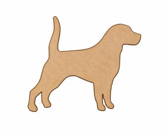 May include: A flat, tan-coloured wooden cutout in the shape of a standing dog with its tail pointed upwards. The silhouette features a smooth, matte surface and clearly defined edges, representing the profile of a canine in a stationary position.