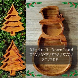 May include: Wooden Christmas tree and snowman-shaped serving trays. The tree tray has a cutout design. The snowman tray has three sections. The text "Digital Download" and file types are visible. The trays are made of wood with a natural finish.