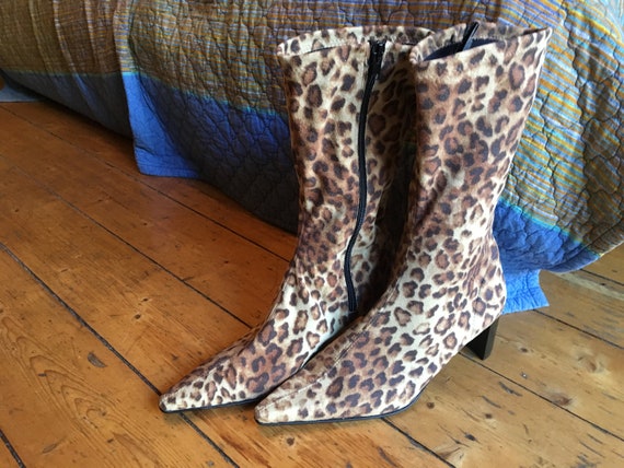 pointed Leo boots high heels