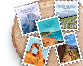 May include: A collection of six vintage-style postage stamps featuring iconic national parks in the United States. The stamps feature images of Yosemite National Park, Acadia National Park, Mount Rainier National Park, Arches National Park, and Zion National Park. Each stamp has a white border and a blue and orange color scheme.