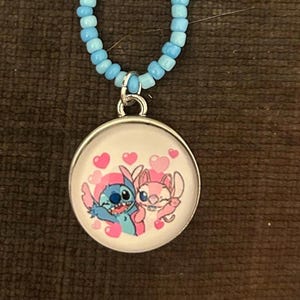 Handmade Disney stitch and angel necklace image 1