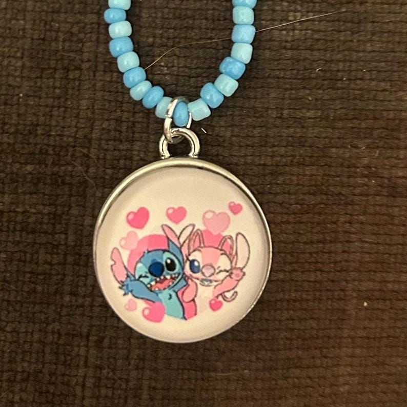 Handmade Disney stitch and angel necklace image 1
