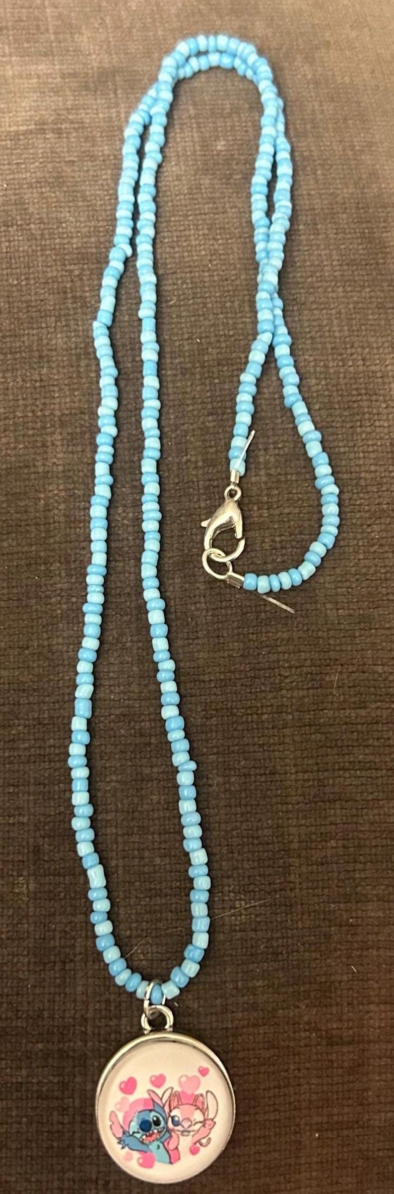 Handmade Disney stitch and angel necklace image 2