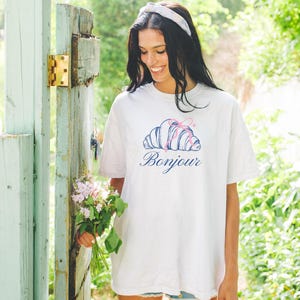 Bonjour Croissant Graphic T-Shirt, French Themed Casual White Tee, Stylish Women's Summer Top, Floral Fashion Outfit