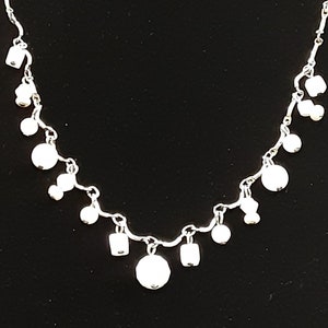 Express ketting met zilveren en witte kralen