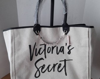 Victoria Secret Pink. This Is A Canvas Bag Done for A Victoria's Secret. This Bag Is in Perfect Condition. 1996 Love Pink. Shoulder Strap.