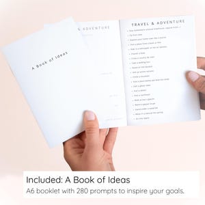 May include: A white A6 booklet titled A Book of Ideas with an open page showing a Travel & Adventure section. The list includes prompts like stay somewhere unusual, fly first class, explore your home town, and visit a ghost town.