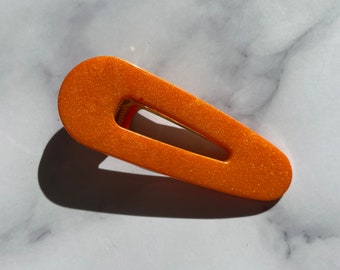 Orange groovy hair clip