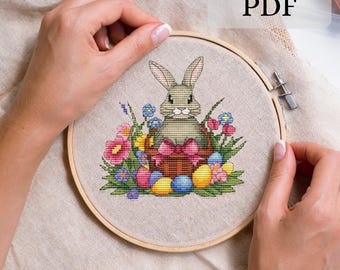 Lapin de Pâques dans un panier, motif point de croix, oeufs peints au point de croix, lapin de Pâques numérique