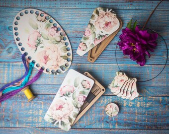 Cross-stitch and embroidery tools, sewing organization, wooden floral accessories, needle minder, scissors box, thread bobbins, floss holder