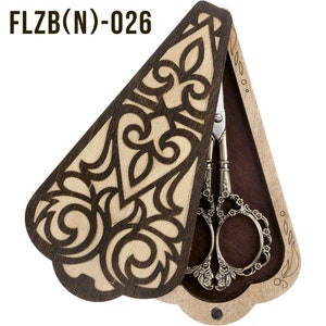 May include: A wooden box with a decorative floral design, open to reveal a pair of silver-toned scissors with ornate details. The box is labeled "FLZB(N)-026".
