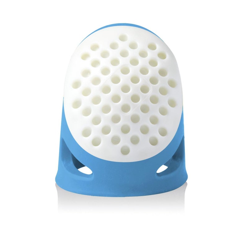 May include: A blue and white thimble with a perforated top. The thimble is made of silicone and has a comfortable grip.