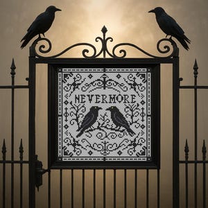 May include: A framed cross-stitch featuring two black crows perched on a branch, with the word "NEVERMORE" above them. The artwork is set against a light background and framed by a black wrought iron gate, with two crow figurines perched on top.