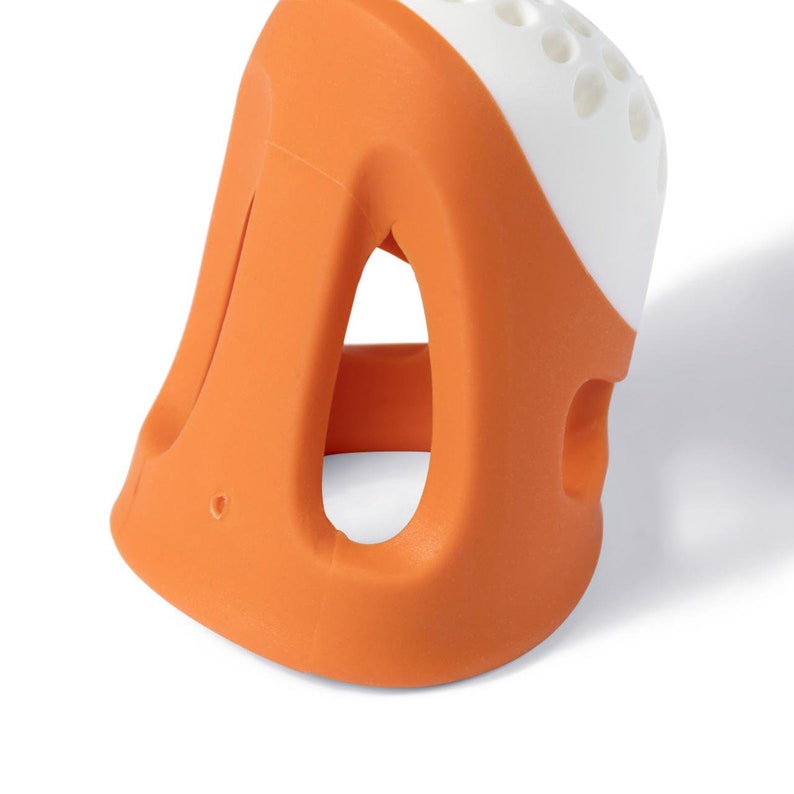 May include: Orange and white silicone nose clip with a hole in the center and a series of small holes on the top. The clip is designed to fit over the bridge of the nose.