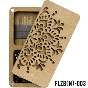 May include: A wooden box with a decorative cutout design on the lid. The box is open and contains a variety of sewing needles and beads. The box is labeled "FLZB(N)-003".