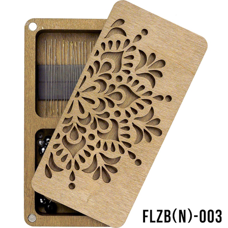 May include: A wooden box with a decorative cutout design on the lid. The box is open and contains a variety of sewing needles and beads. The box is labeled "FLZB(N)-003".
