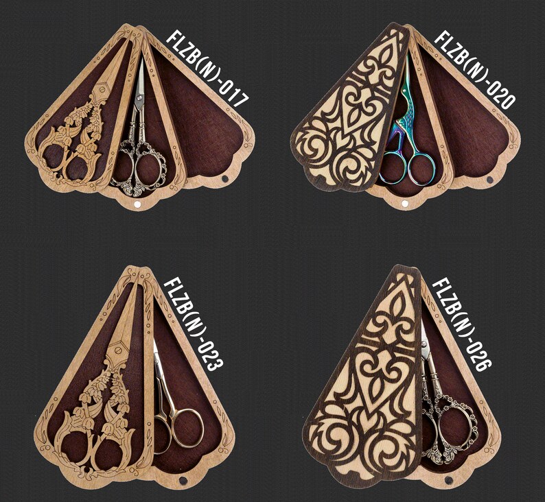 May include: Four wooden boxes with intricate laser-cut designs, each containing a pair of decorative scissors. The boxes are shaped like a fan and have a brown wood finish. The scissors are silver, gold, and rainbow-colored.