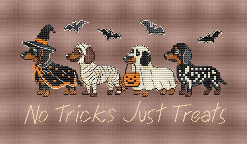 May include: A cross-stitch pattern on a brown background featuring four dachshunds in Halloween costumes: a witch, a mummy, a ghost holding a pumpkin bucket, and a skeleton. Four black bats fly above the dogs, and the text reads No Tricks Just Treats.