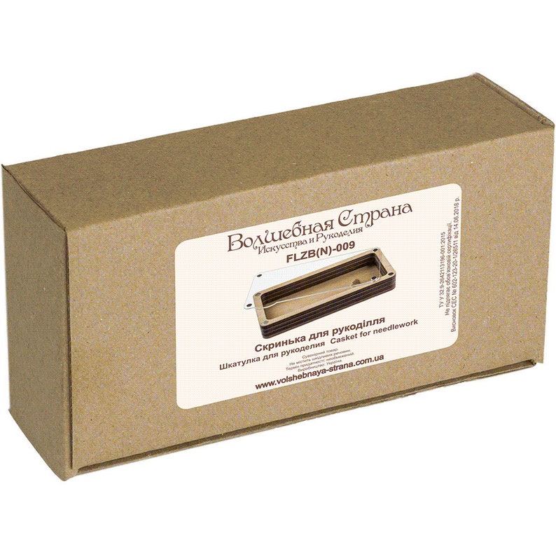 May include: A cardboard box with a label that reads "Volsebnaya Strana" in Russian. The label also includes the text "FLZB(N)-009" and "Casket for needlework".