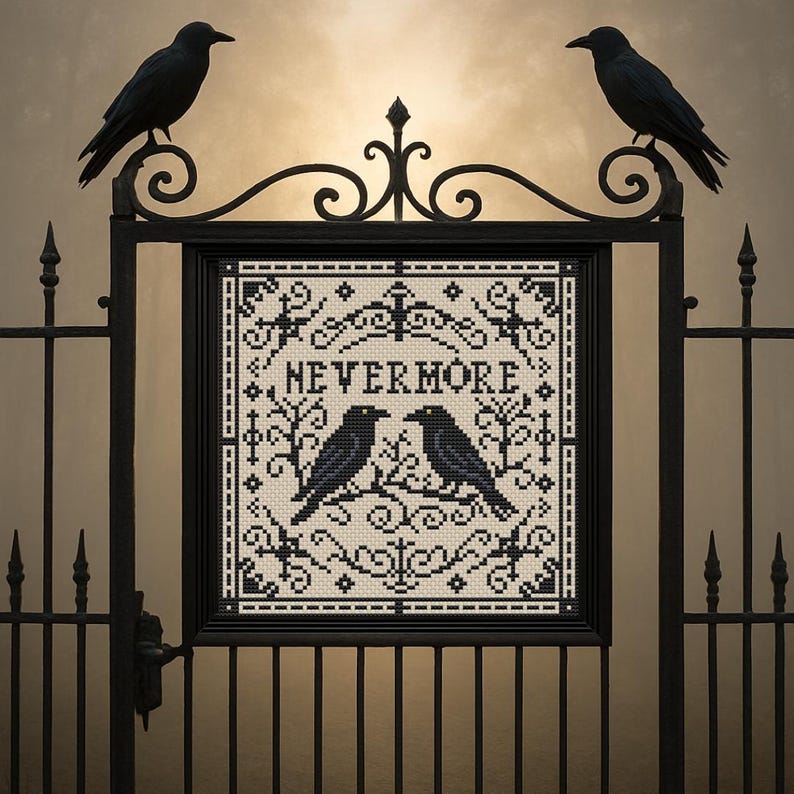 May include: A framed cross-stitch featuring two black crows perched on a branch, with the word "NEVERMORE" above them. The design is set against a cream background and framed in black. Two black crows sit atop a decorative black gate.