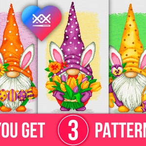 May include: Three cross-stitch patterns featuring gnomes with bunny ears. The gnomes are wearing different colored hats and holding Easter-themed items, such as flowers, eggs, and a basket.