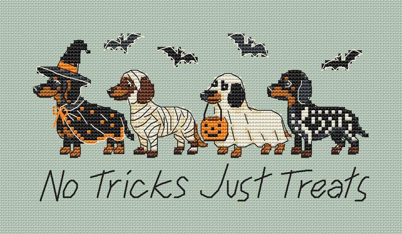 May include: A cross-stitch pattern on light green fabric featuring four dachshunds in Halloween costumes: a witch, a mummy, a ghost holding a pumpkin bucket, and a skeleton. Four black bats fly above, and the text reads No Tricks Just Treats.
