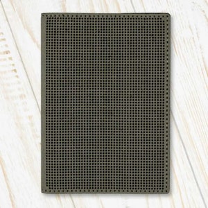 May include: A dark grey, rectangular, textured, fabric wallet with a grid pattern.