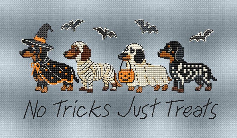 May include: A cross-stitch pattern on light blue fabric featuring four dachshunds in Halloween costumes: a witch, a mummy, a ghost holding a pumpkin bucket, and a skeleton. Four black bats fly above, with the text No Tricks Just Treats below.