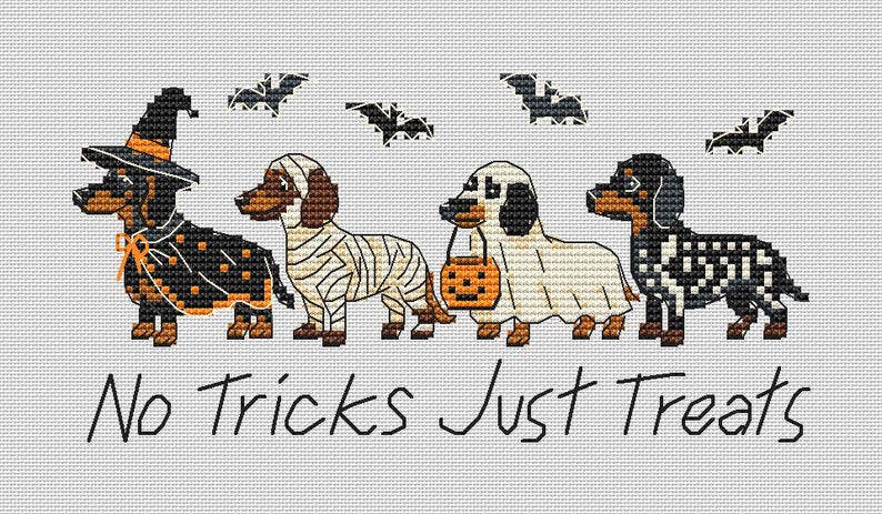 May include: A cross-stitch pattern on light gray fabric featuring four dachshunds in Halloween costumes: a witch, a mummy, a ghost holding a pumpkin bucket, and a skeleton. Four black bats fly above, and the text reads No Tricks Just Treats.