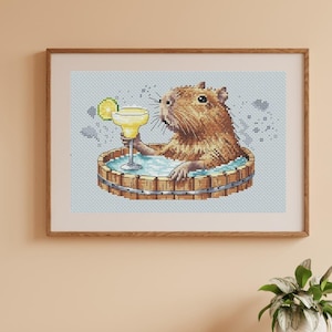 Capybara with a glass of martini cross stitch pattern, summer continues x-stitch design, funny capybara relaxes counted cross stitch