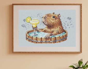 Capybara with a glass of martini cross stitch pattern, summer continues x-stitch design, funny capybara relaxes counted cross stitch
