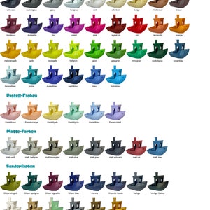 May include: A chart of 48 different colors of plastic filament for 3D printing. The colors are organized into categories: Standard, Pastel, Matte, and Special. Each color is represented by a small plastic boat.