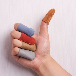 25 Pcs silicone thimble Thumb Finger Protector Guitar Finger Cots