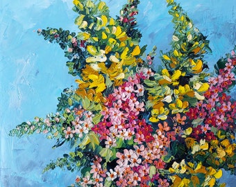 May include: An original oil painting of a floral arrangement in a clear glass vase. The flowers are a mix of yellow, pink, and white, with green leaves. The background is a textured light blue. The painting is signed in the bottom left corner.