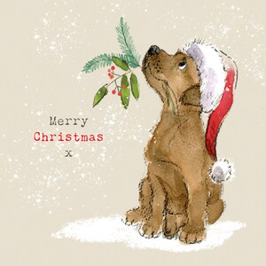 May include: A watercolor illustration of a brown dog wearing a red Santa hat and looking up at a sprig of holly with red berries. The text "Merry Christmas" is written in red below the dog.