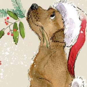 May include: A brown dog wearing a red and white Santa hat looks up at a sprig of holly with red berries. The background is a light beige with white speckles.